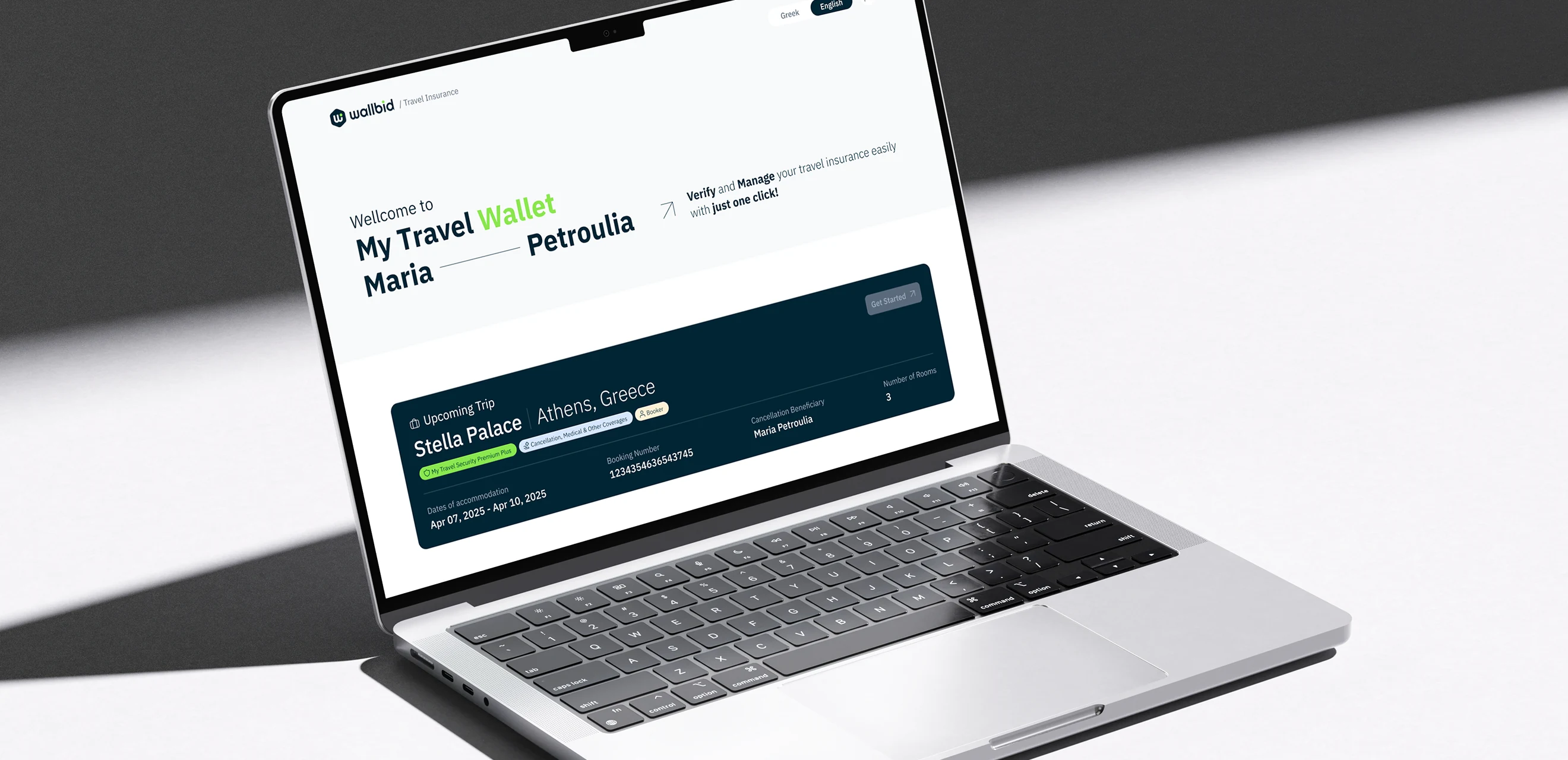 My Travel Wallet open on a laptop, showing the traveller name and an upcoming trip to Athens