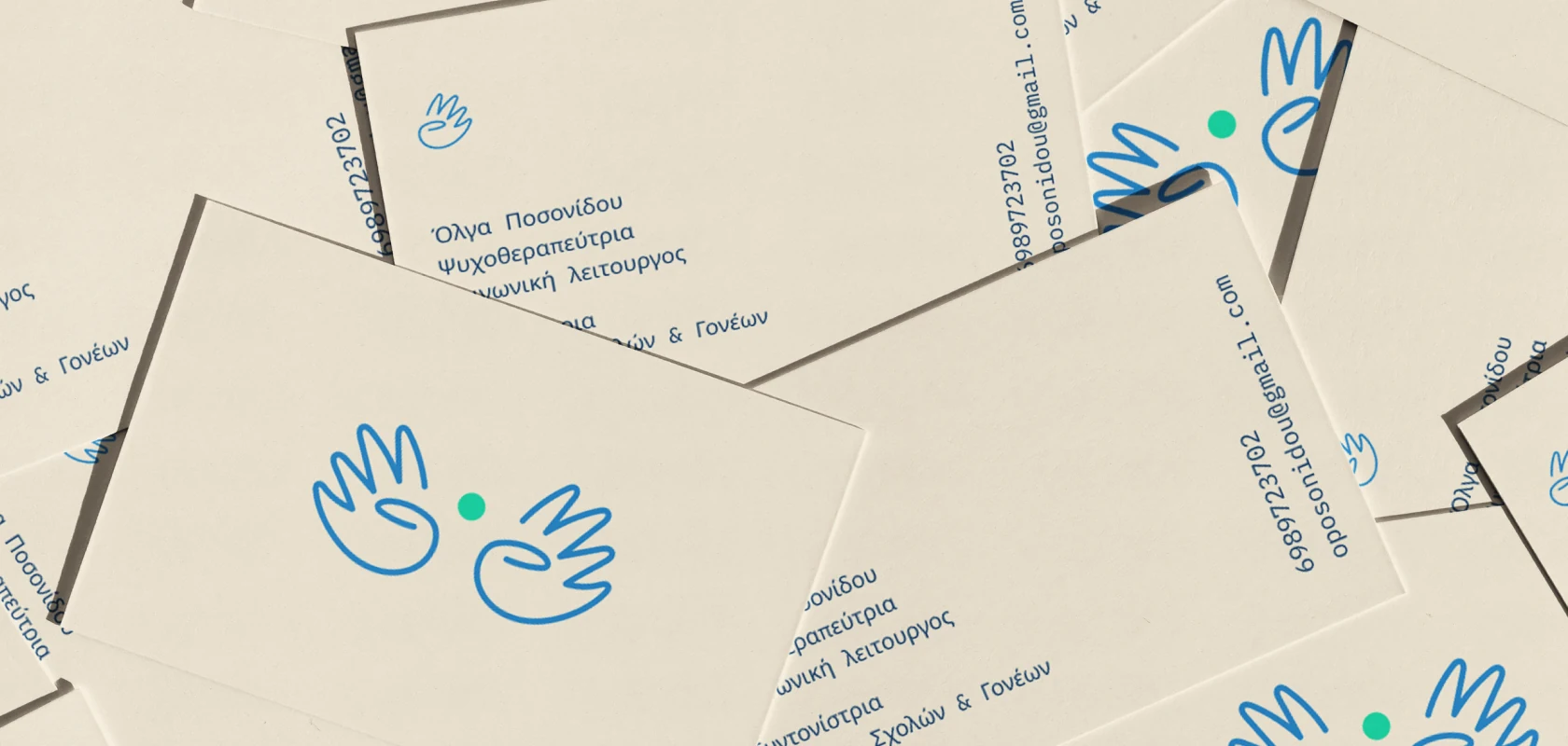 The cards face up and overlapping, the hand mark centred on the cream side